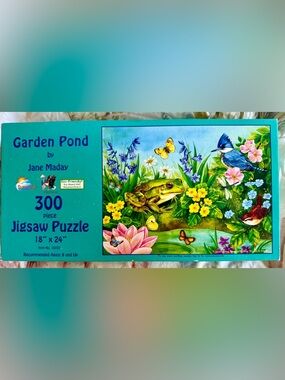SunsOut Garden Pond 300-Piece Jigsaw Puzzle by Jane Maday